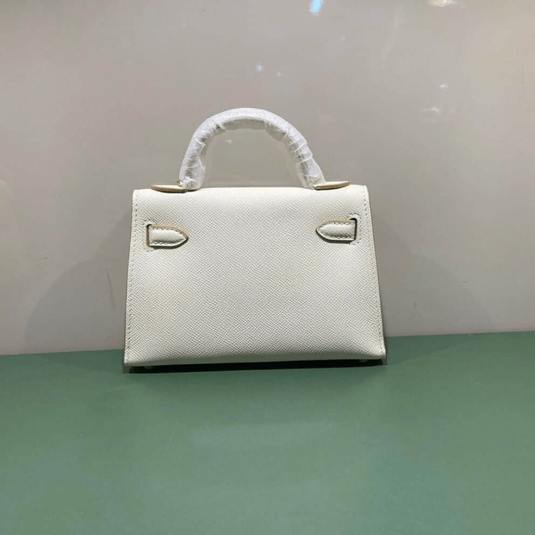 Hermès Kelly 20 Tasche mit goldener Hardware in Offwhite