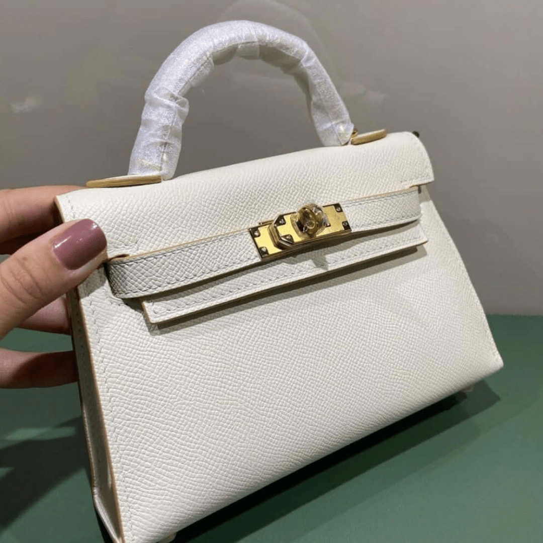 Hermès Kelly 20 Tasche mit goldener Hardware in Offwhite