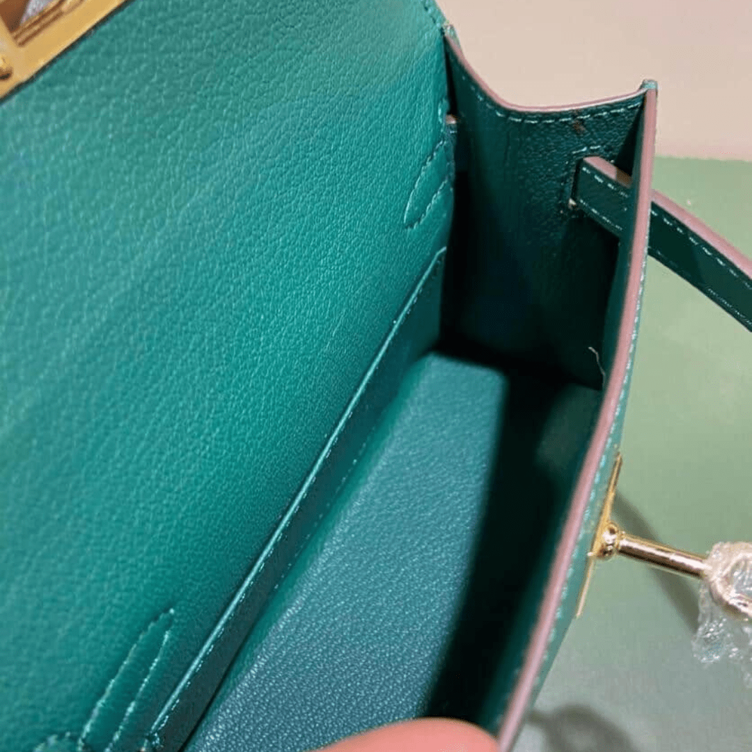 Hermès Kelly 20 Tasche mit goldener Hardware in Grün
